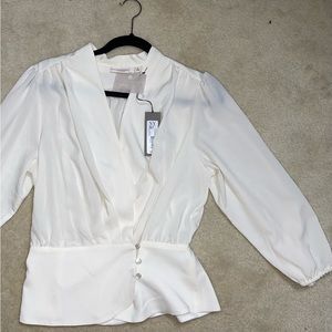 White dressy 3 quarter sleeve top from NY&CO (Eva Mendez collection).